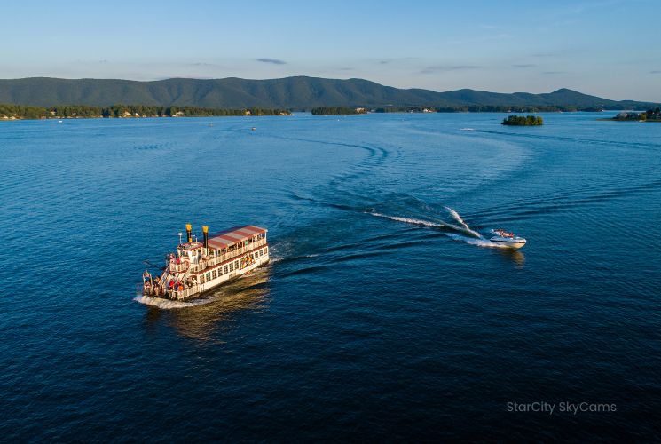 The Virginia Dare paddle boat cruises the main channel of Smith Mountain Lake at sunset