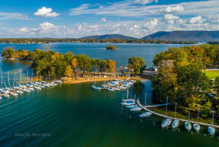 Sailboats lined up at SML Yacht Club with Smith Mountain in the background