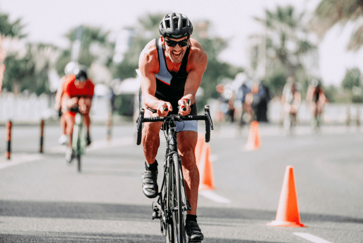 A  cyclist competes in the bike portion of triathlon