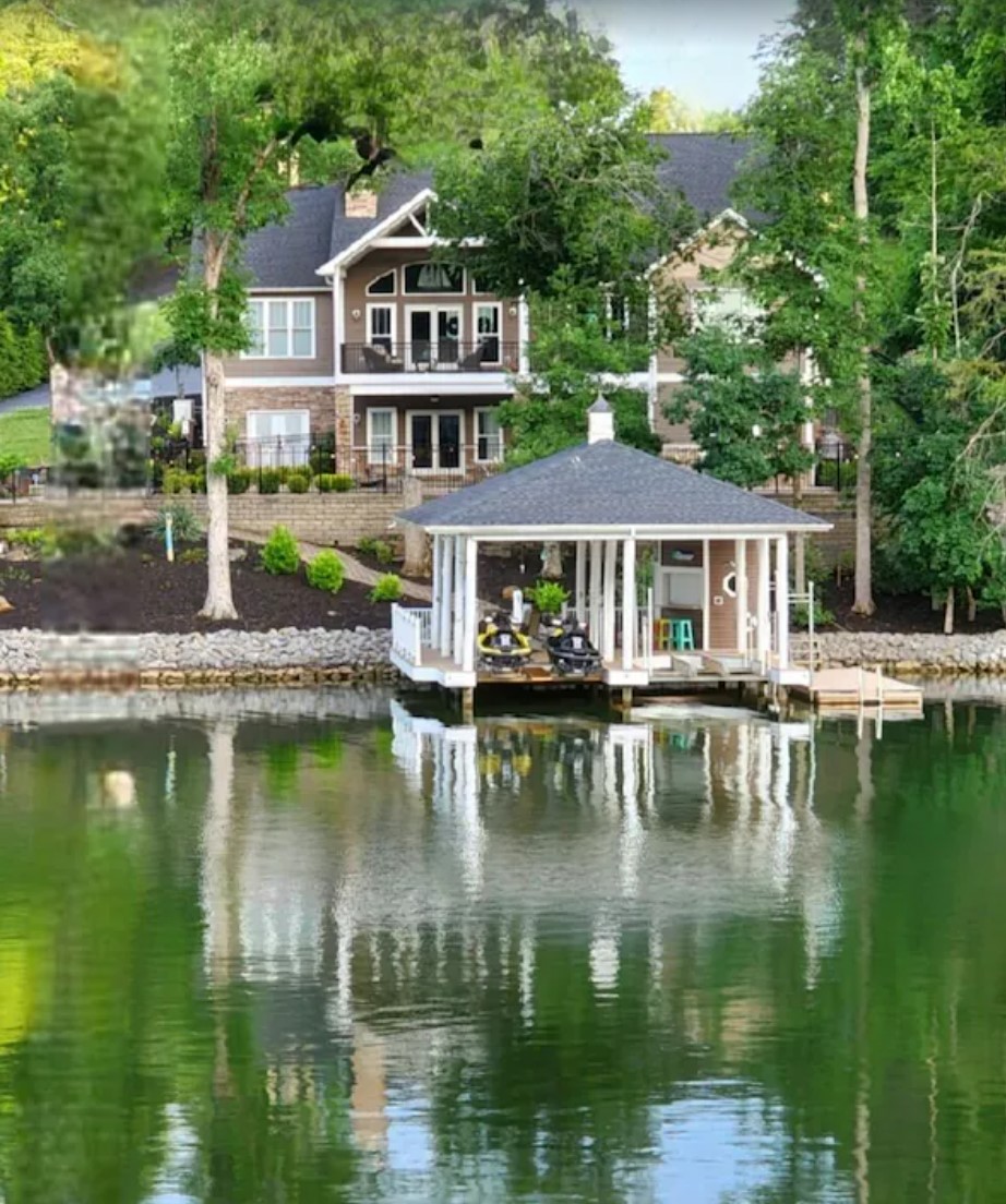 Lake, dock and luxury vacation rental house at Smith Mountain Lake, VA