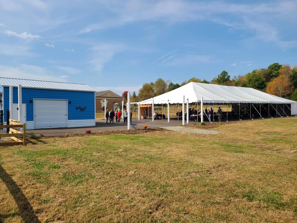 The 40 by 100 foot tent at SML Pavilion with adjacent green space.
