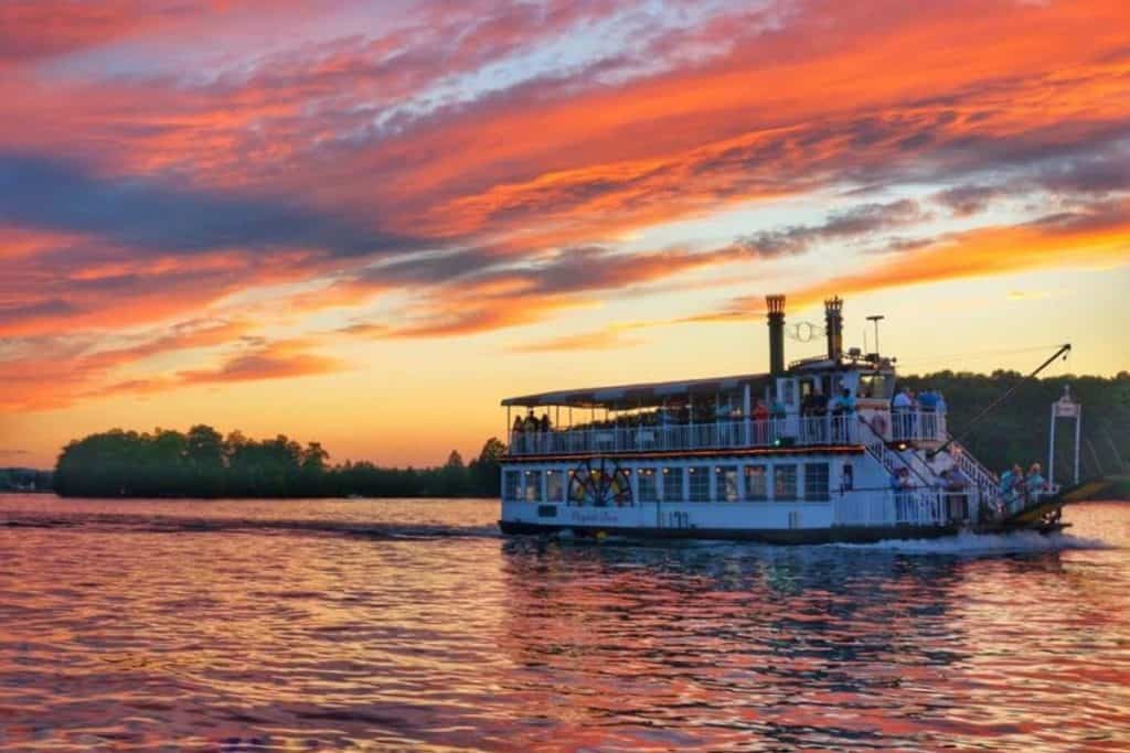 The Virginia Dare cruise boat with a beautiful red and purple sunset