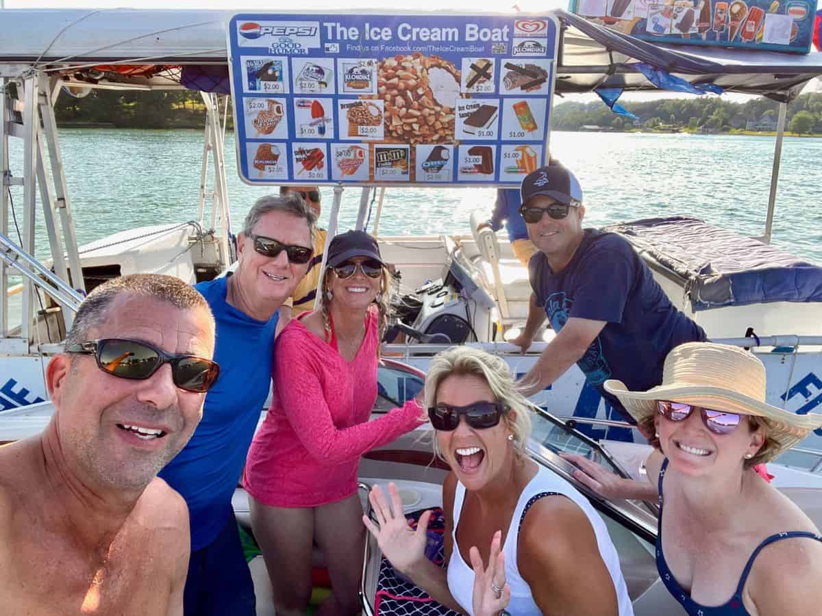 friends enjoying ice cream from the ice cream boat on Smith Mountain Lake, Virginia.