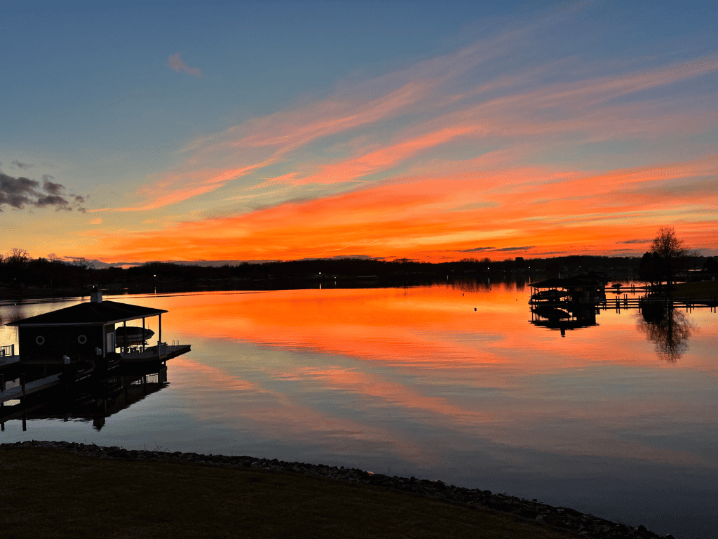 A stunning deep orange Smith Mountain Lake sunset