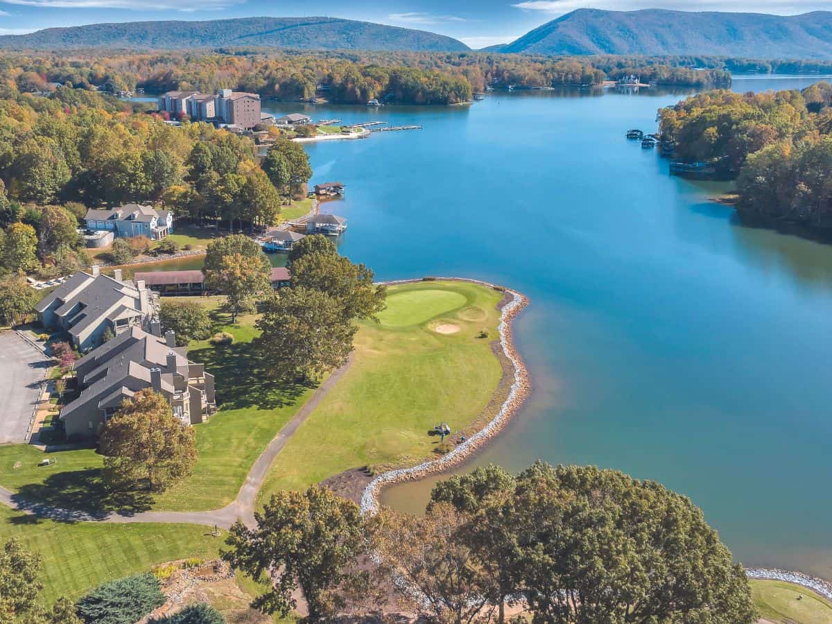 Aerial of a golf hole at Mariners Landing with Smith Mountain and the lake in the background.