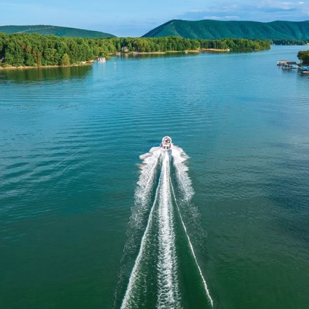 SML Insiders summer issue cover with an aerial photo of a boat heading toward Smith Mountain.