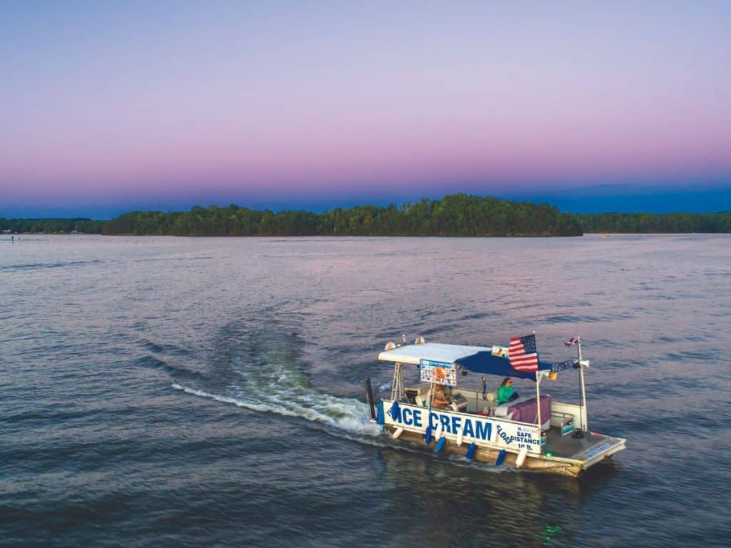 A purple sky serves as the backdrop for a run of the SML Ice Cream Boat.