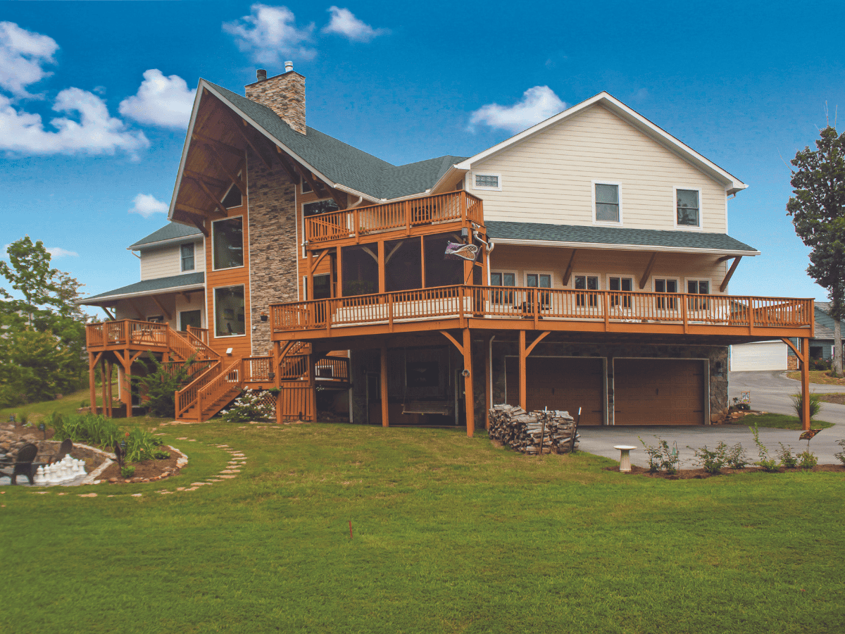 Sprawling timber frame home with peaked roof at Smith Mountain Lake, VA.
