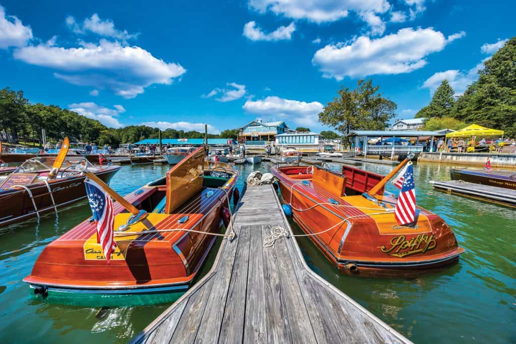 Two immaculately restored wooden boats at the SML Antique & Classic Boat Show.