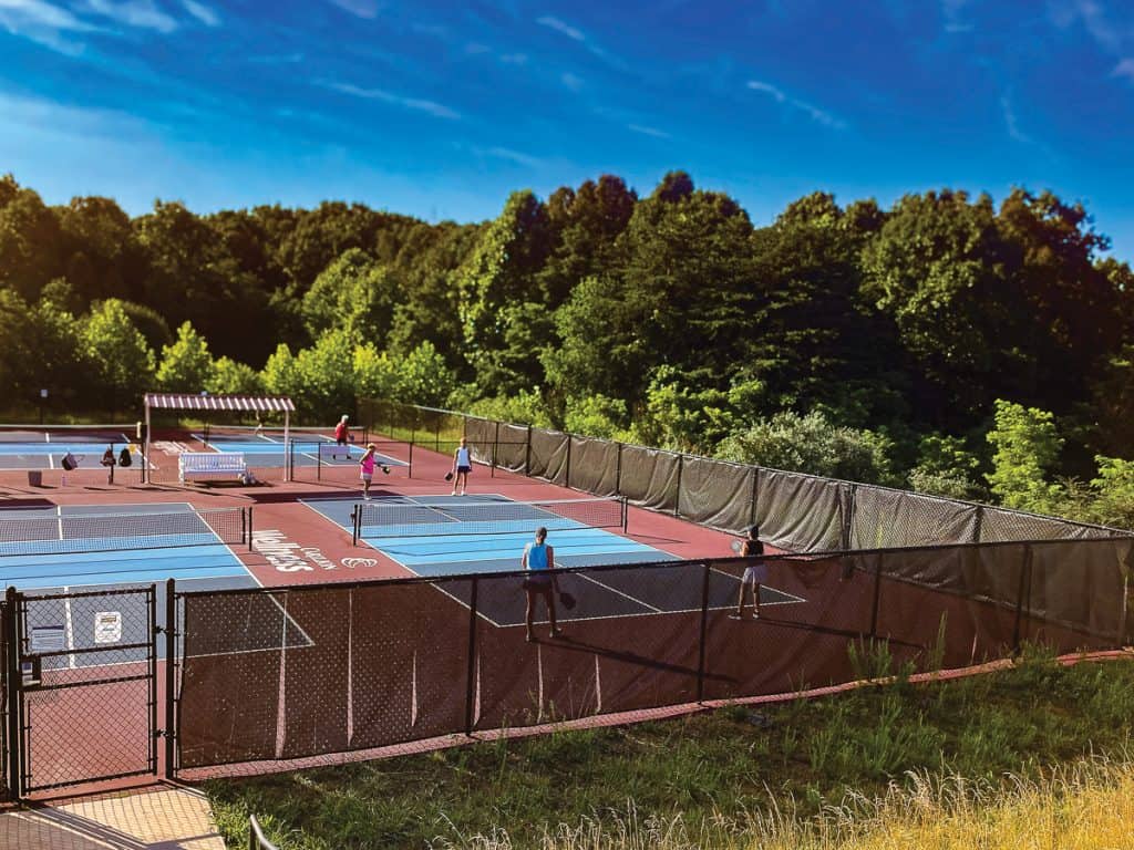 People playing pickleball at Smith Mountain Lake courts.