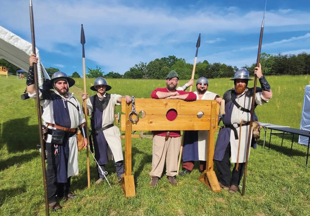 Armored fighters and costumed attendees at the Olde Dominion Fantasy & Medieval Faire at Wind Vineyards.