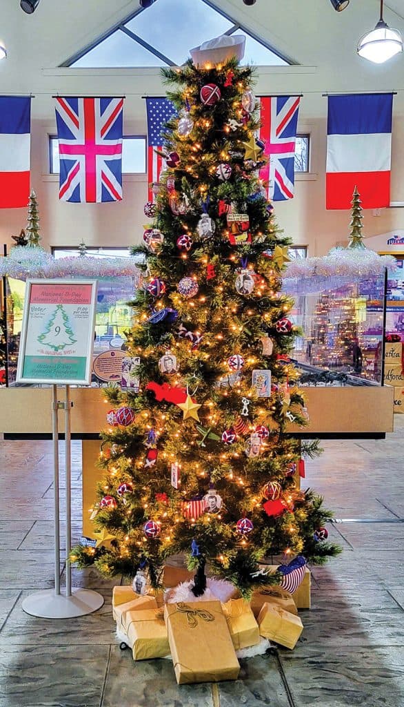 A brightly lit and decorated Christmas tree in Bedford, VA