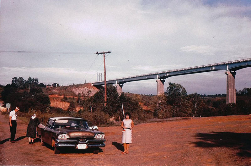 A family below Hales Ford Bridge in September 1963 before flooding begins