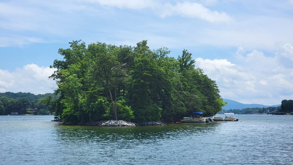 Boats tied up to Betty's Island at Smith Mountain lake