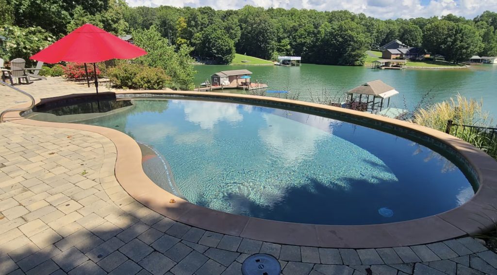 Shimmering pool at luxury vacation rental home on Smith Mountain Lake, VA.