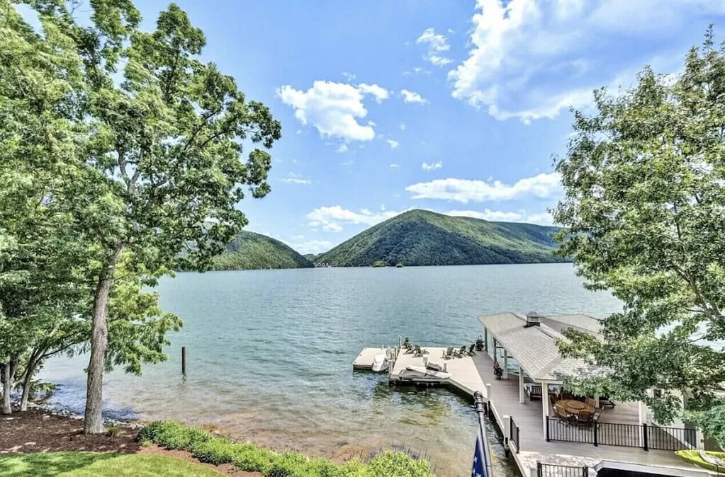 Expansive dock at Smith Mountain Lake, VA, vacation rental home with a view of the gap in Smith Mountain where the dam is located.