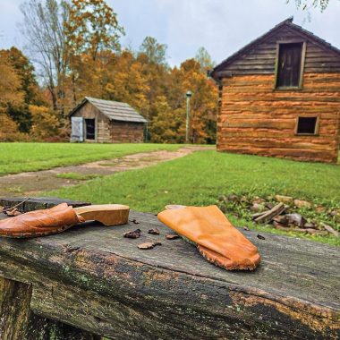 Booker T. Washington National Monument reconstructed cabin and split‑rail fence in Hardy, Virginia, near Smith Mountain Lake.