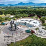 National D‑Day Memorial Overlord arch and reflecting pool in Bedford, Virginia, near Smith Mountain Lake.