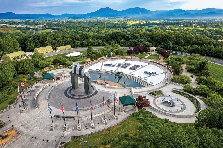 National D‑Day Memorial Overlord arch and reflecting pool in Bedford, Virginia, near Smith Mountain Lake.
