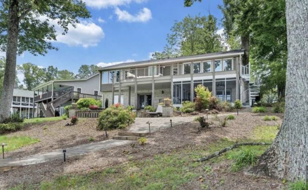 Lakeside view of modern SML vacation rental home.