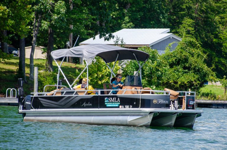 Ferrum College research vessel pontoon boat on Smith Mountain Lake for water testing