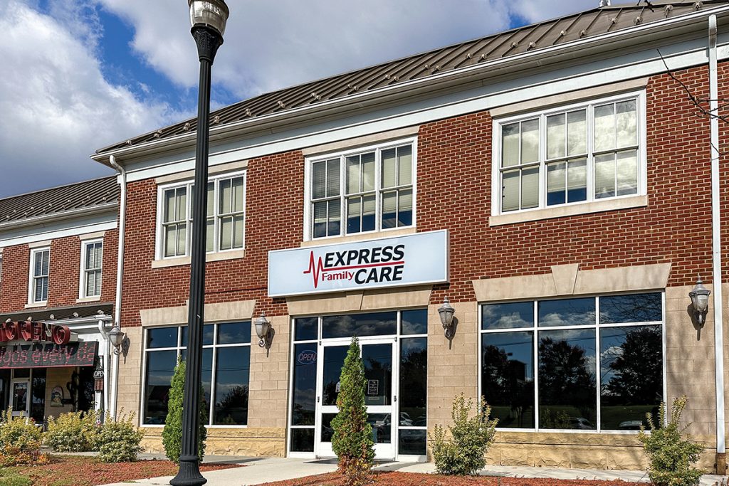 Modern brick building housing Express Family Care urgent care facility at Westlake Corner near Smith Mountain Lake