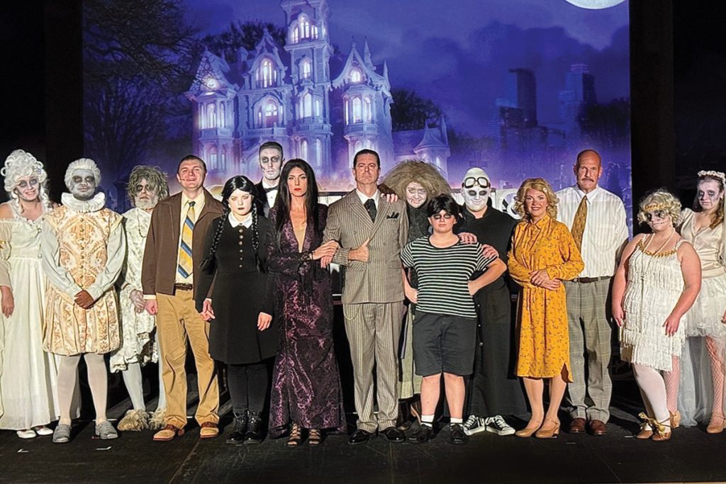 Cast of The Addams Family musical on stage at Westlake Cinema, possible future home of the Smith Mountain Lake Center