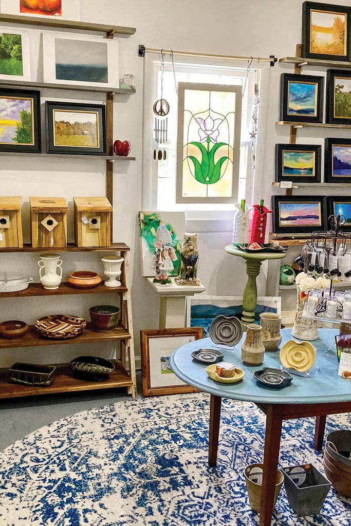 Art gallery featuring paintings, wood carvings, stained glass and pottery at Shop at the Nines, Smith Mountain Lake