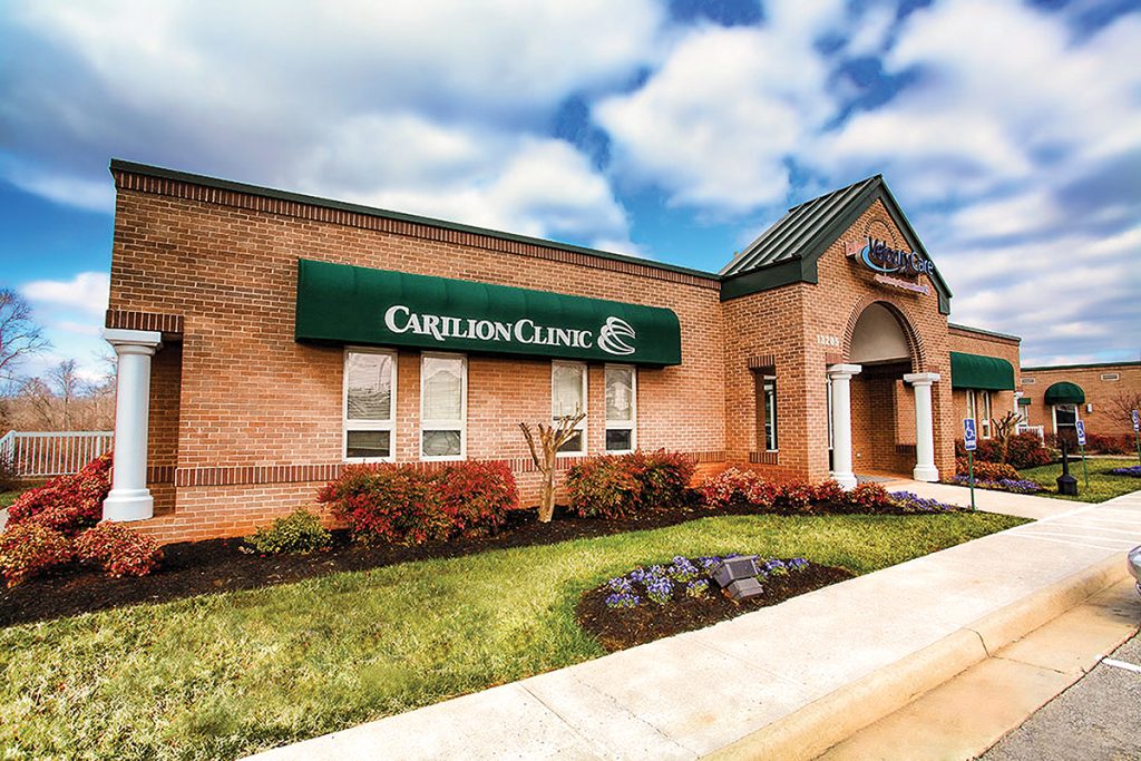 Carilion VelocityCare urgent care facility exterior at Westlake Corner with signage and parking area