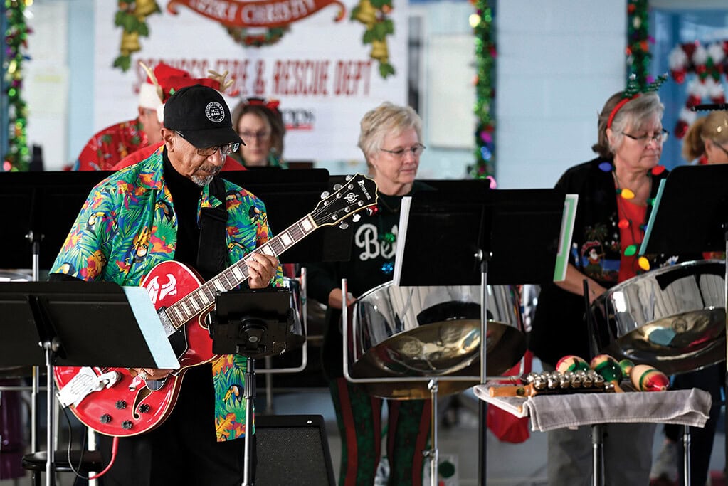 SML Steel Drum Band performing holiday music at Saunders Volunteer Fire Company, photo by Jeff Reid