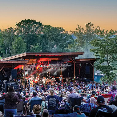 Old Crow Medicine Show performing at The Coves Amphitheater outdoor concert venue with crowd at Smith Mountain lake, photo by Casey Johnson, Realtor