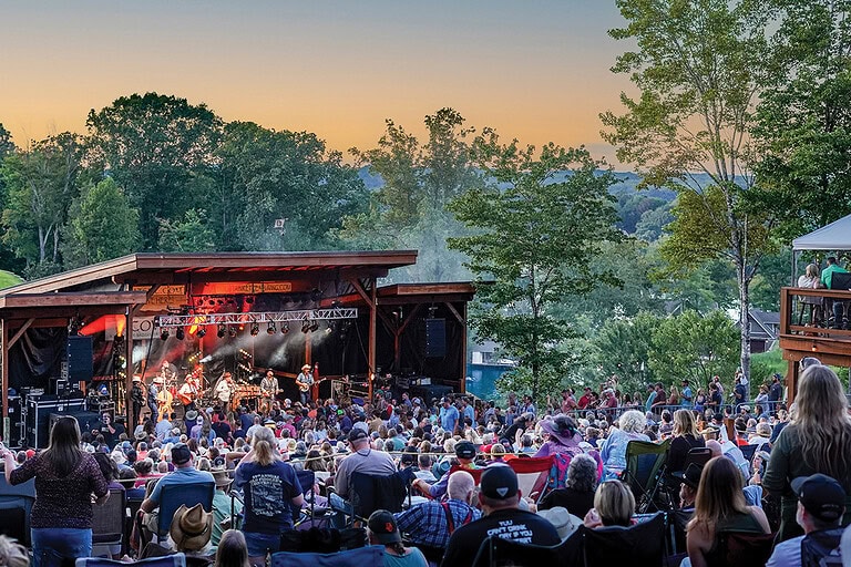 Old Crow Medicine Show performing at The Coves Amphitheater outdoor concert venue with crowd at Smith Mountain lake, photo by Casey Johnson, Realtor