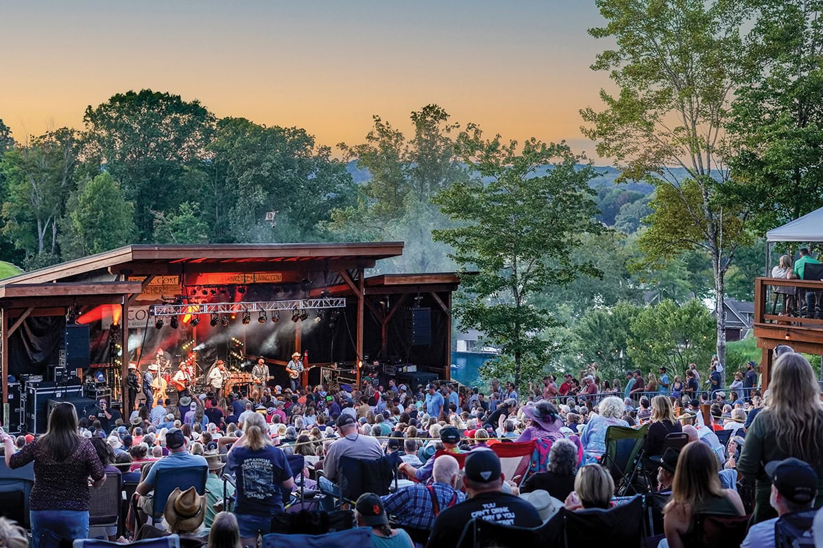 Old Crow Medicine Show performing at The Coves Amphitheater outdoor concert venue with crowd at Smith Mountain lake, photo by Casey Johnson, Realtor