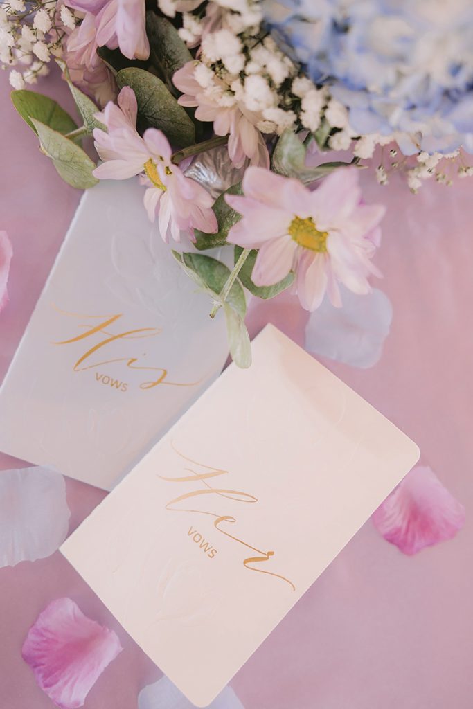 Wedding invitation suite with Mr. and Mrs. calligraphy and pink floral accents at Smith Mountain Manor photographed by Amative Creative