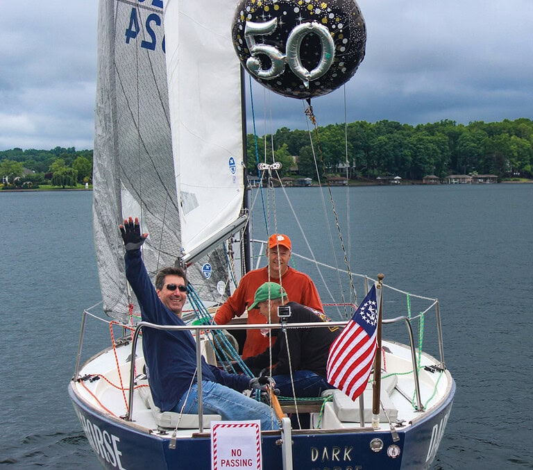 Sailors compete in the 50K Around the Lake race, one of the most memorable on-the-water events of the anniversary celebration.