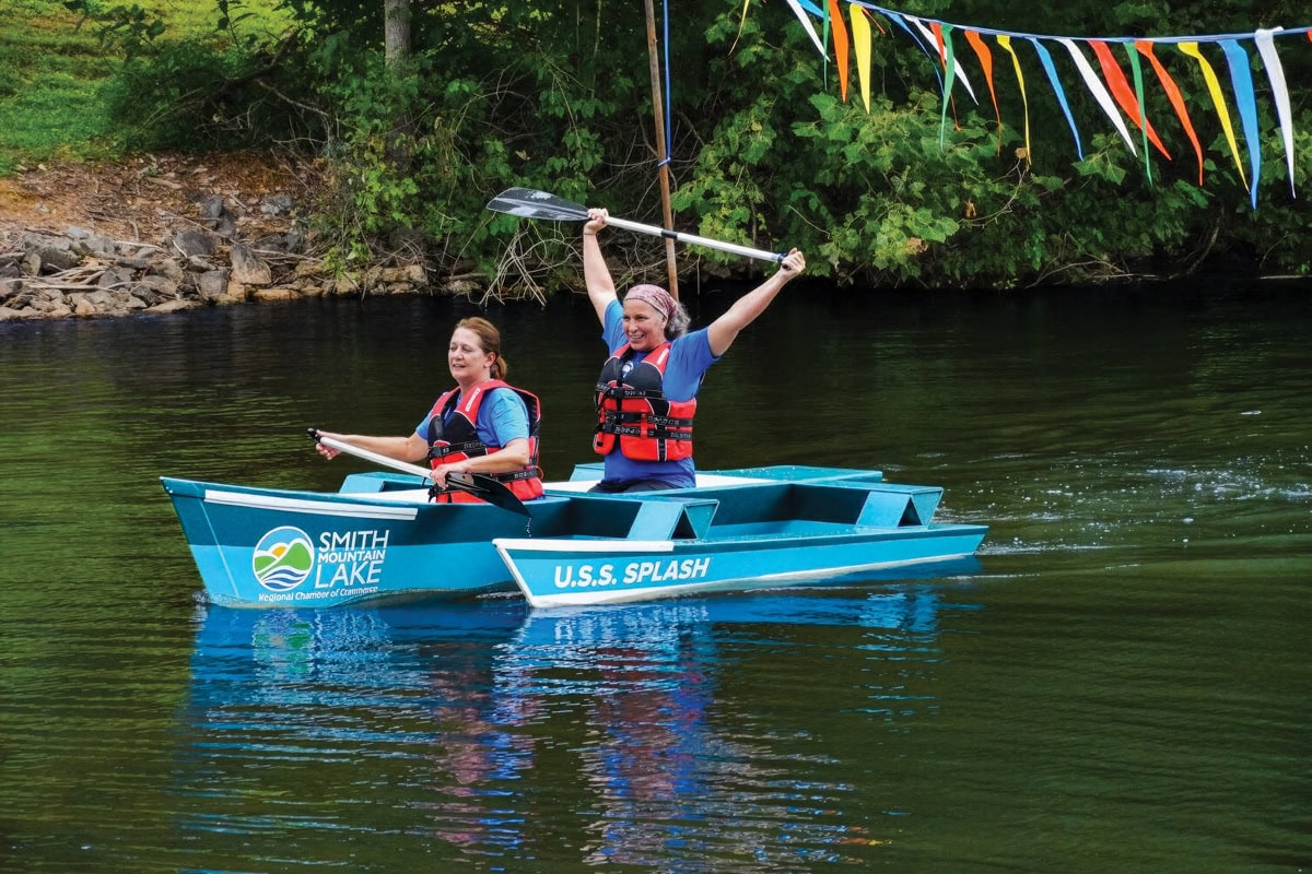Cardboard Boat Regatta showcasing creative boats built from cardboard and tape.