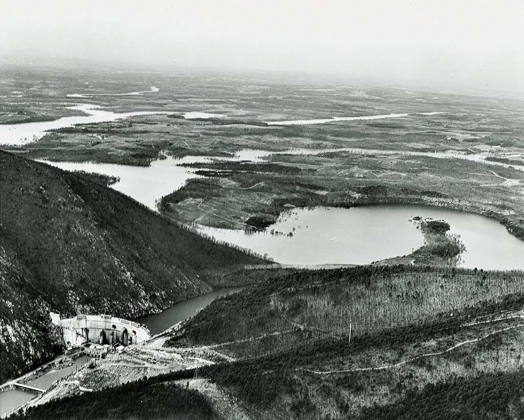 1960s — Smith Mountain Dam construction begins, launching the project that will create the lake.