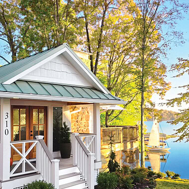 A refreshed 1970s Moneta cottage exterior at Smith Mountain Lake with low-maintenance finishes.