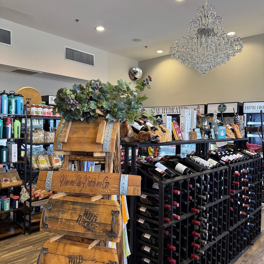 Bottles of wine lined up in racks at a Smith Mountain Lake wine shop