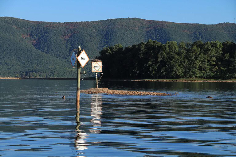 A channel marker is exposed during low water at Smith Mountain Lake, VA.