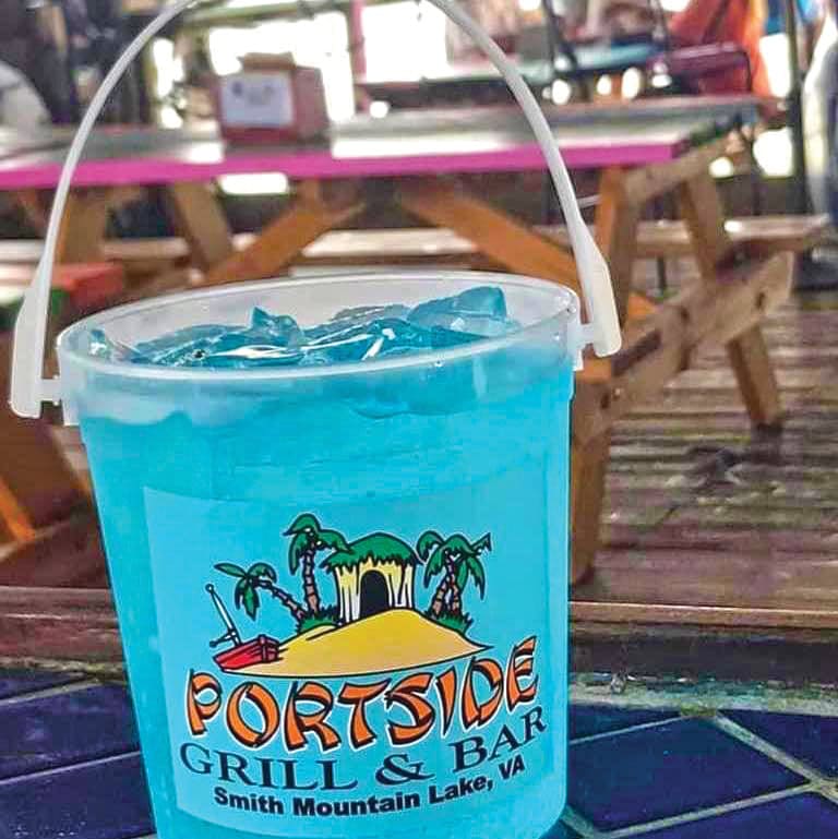 Blue Lagoon signature cocktail served in a souvenir bucket at Portside Grill & Bar, Smith Mountain Lake