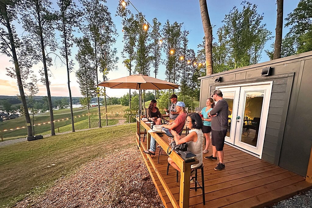 Concert goers at The Coves Amphitheater enjoy a skybox overlooking Smith Mountain Lake.