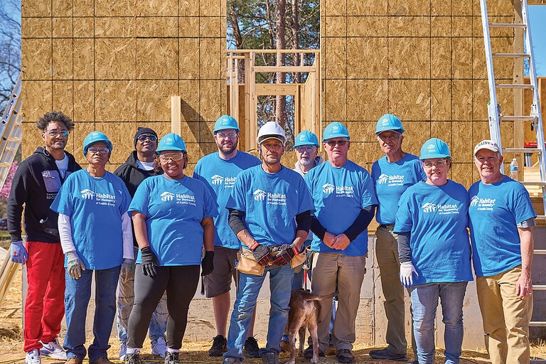 Volunteers take a break from framing a Habitat for Humanity home in Franklin County, Virginia