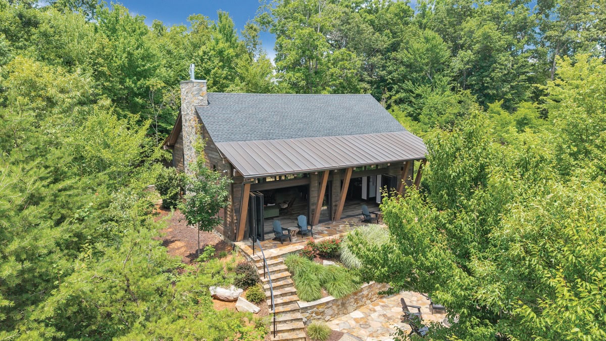 Aerial exterior of the bourbon barn tucked in the trees at Smith Mountain Lake