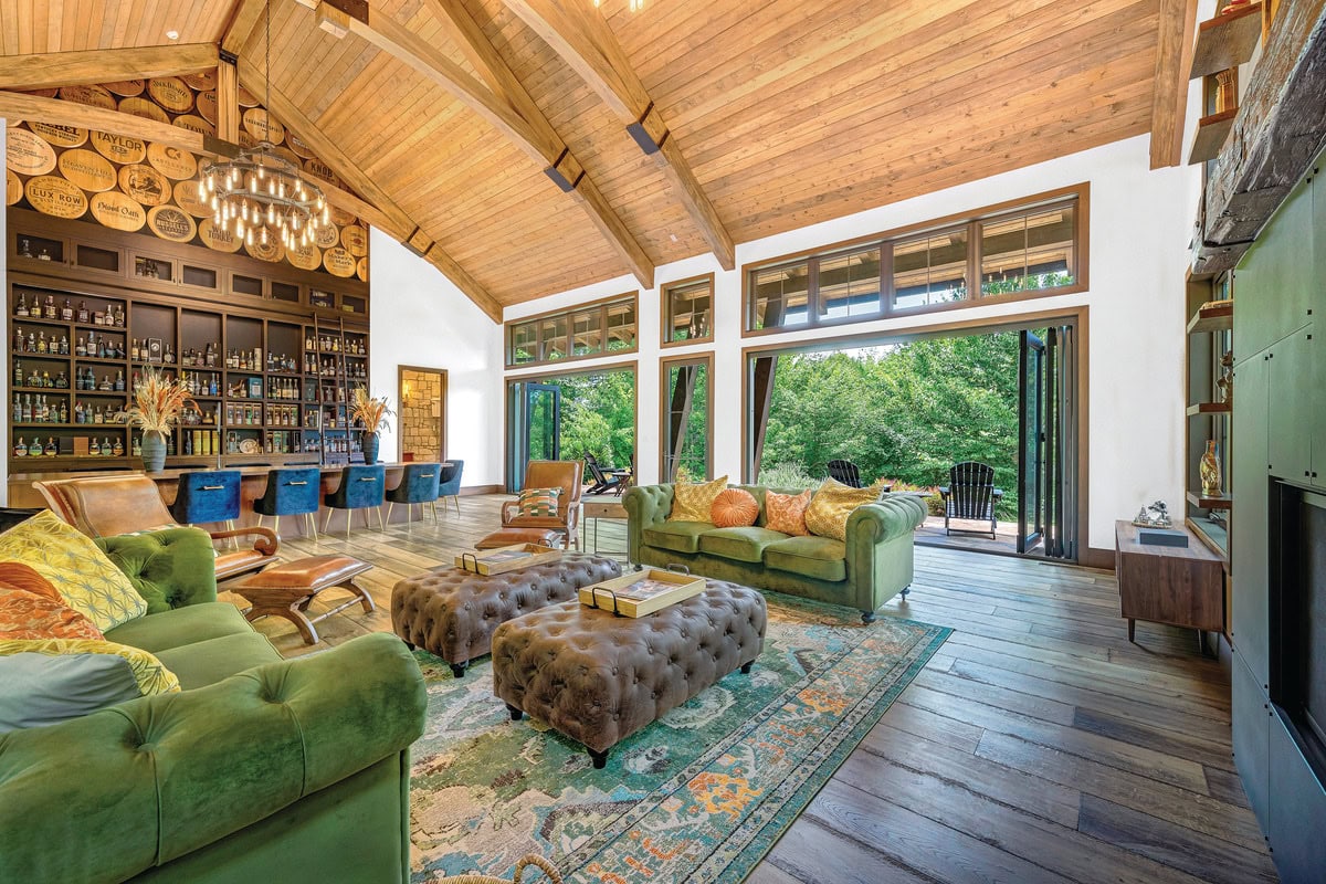 Soaring wood-and-glass interior of the LaBella Bourbon Barn at Smith Mountain Lake