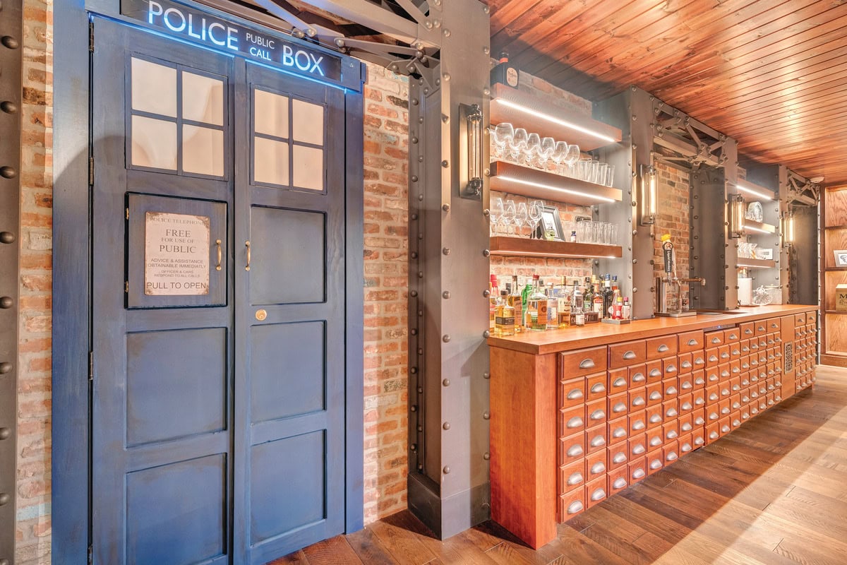Replica Tardis and cabinets designed to mimic ones from an old apothecary highlight the speakeasy.
