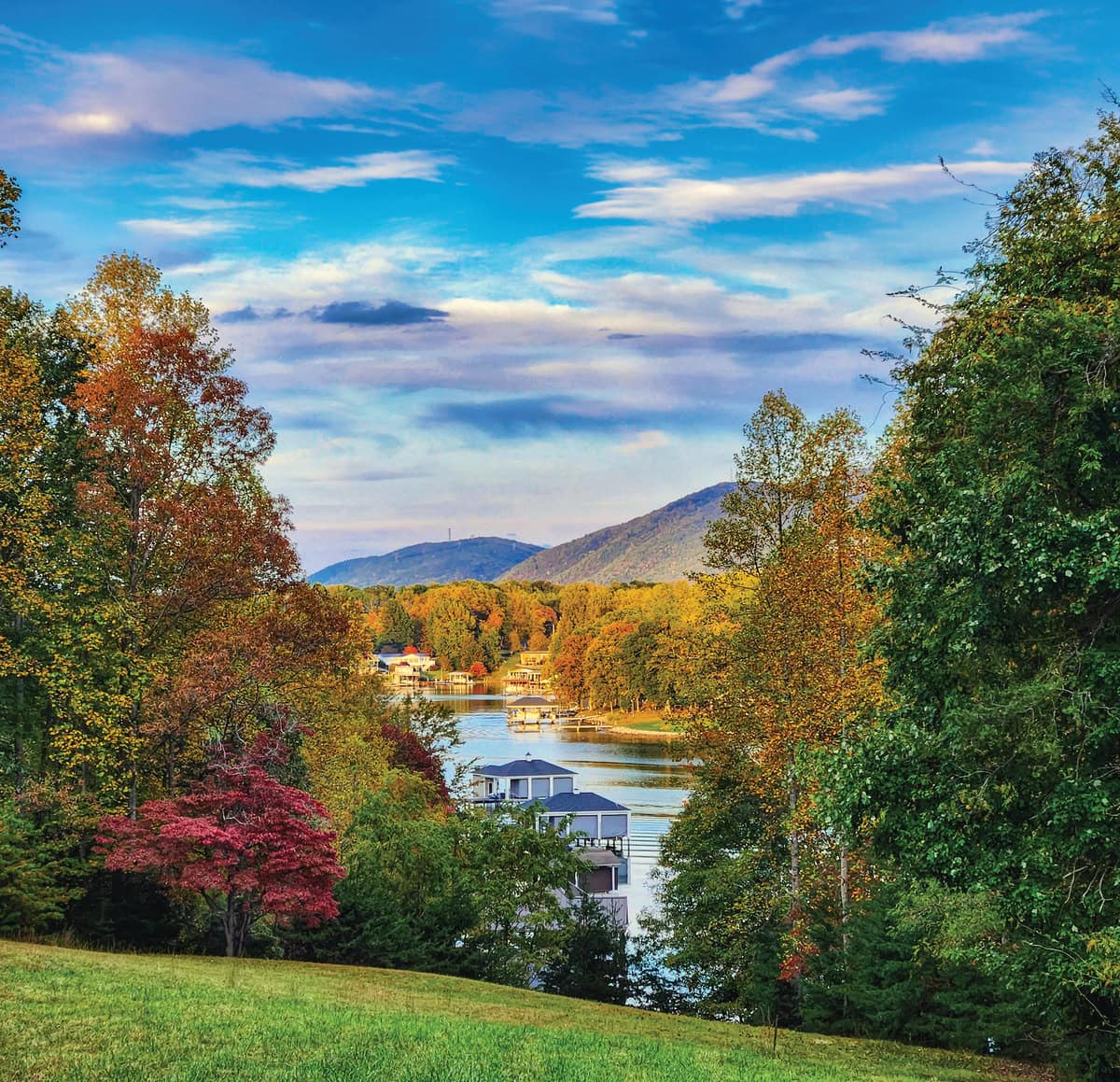 Autumn color surrounds a dock at Smith Mountain Lake, Virginia.