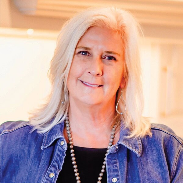 Professional headshot of Debbie Shelton, Berkshire Hathaway HomeServices real estate agent